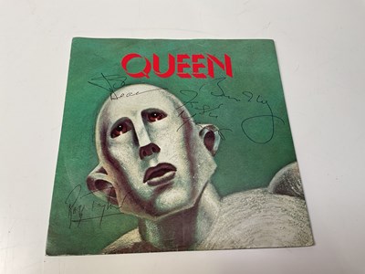 Lot 2117 - QUEEN; a 45 RPM 'We will rock you/ We are the...
