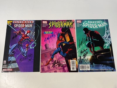 Lot 2304 - SPIDERMAN; three comic books, two signed by...