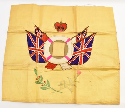 Lot 624 - A Trench Art embroidered photograph frame...