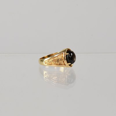Lot 844 - A yellow metal gentlemen's signet ring set...