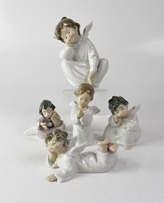 Lot 574 - LLADRÓ; five figures of angels, height of...