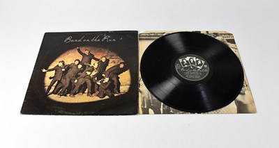 Lot 266 - WINGS; LP, 'Band on the Run', signed verso by...