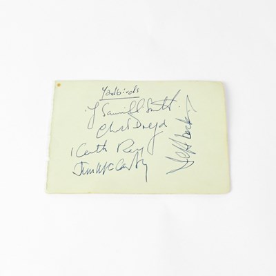 Lot 177 - THE YARDBIRDS; a torn page from an autograph...