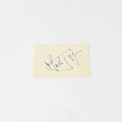 Lot 215 - MICK JAGGER; a small torn page from an...