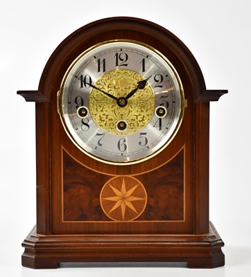 Lot 2278 - A modern mahogany bracket clock, the silvered...