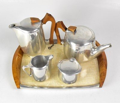 Lot 422 - PIQUOT WARE; a five-piece tea service with...