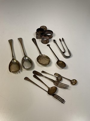 Lot 1016 - A group of small silver including five napkin...