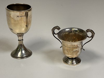 Lot 1140 - A hallmarked silver trophy goblet with knopped...