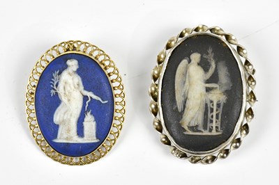 Lot 2188 - A 9ct gold framed Wedgwood blue cameo brooch...