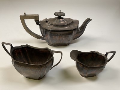 Lot 1017 - An Edwardian hallmarked silver three piece tea...