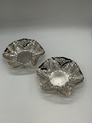 Lot 1052 - THE ROYAL IRISH SILVER COMPANY; a pair of...