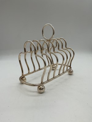 Lot 1040 - GEORGE BISHOP; an Edwardian hallmarked silver...