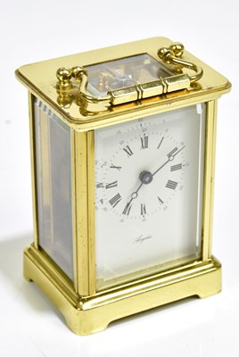 Lot 2256 - ANGELUS; a brass cased carriage clock, with...