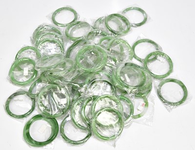 Lot 2166 - A large quantity of green stone bangles.
