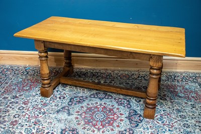 Lot 2578 - A modern oak refectory type dining table, on...