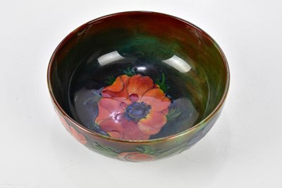 Lot 85 - WALTER MOORCROFT; a footed bowl, decorated in...