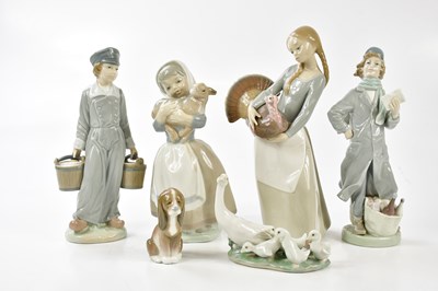 Lot 1422 - LLADRO; three figures and two models of...