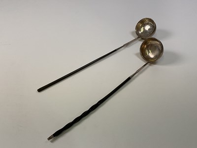 Lot 1125 - Two Georgian toddy ladles with white metal...