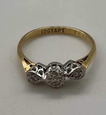 Lot 1242 - An 18ct yellow gold platinum tipped illusion...