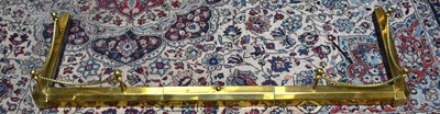 Lot 1140 - A modern brass fender, width 134cm.
