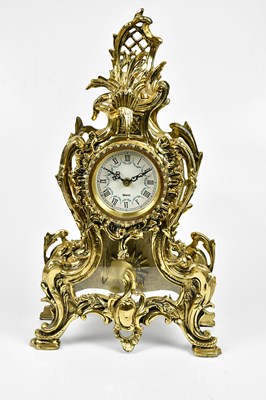Lot 2291 - A modern Louis the XV style gilt metal mantle...