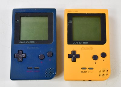 Lot 1107 - Two Gameboy pocket consoles, together with...