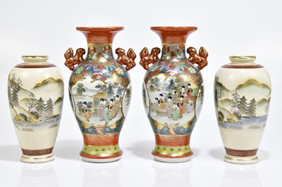 Lot 1592 - A pair of Japanese Satsuma vases decorated...