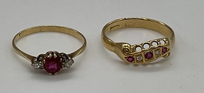 Lot 1213 - Two 18ct yellow gold diamond and ruby rings,...