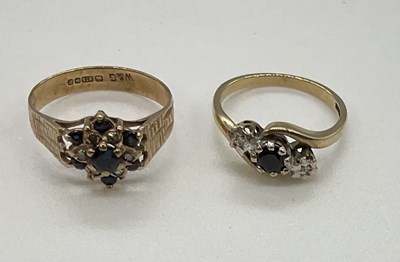 Lot 1252 - Two 9ct yellow gold dress rings set with...