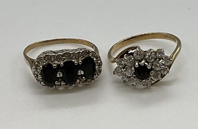 Lot 1208 - Two 9ct yellow gold dress rings set with...