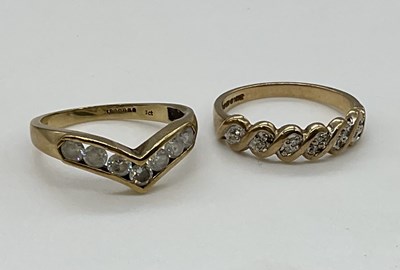 Lot 1257 - Two 9ct yellow gold dress rings, combined...