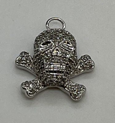 Lot 1209 - An 18ct white gold and pavé set diamond...