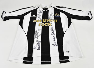Lot 1336 - NEWCASTLE UNITED; a signed home shirt, signed...