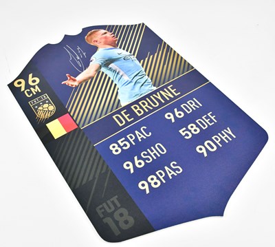 Lot 1408 - KEVIN DE BRUYNE; an autographed 2018 FIFA FUT...