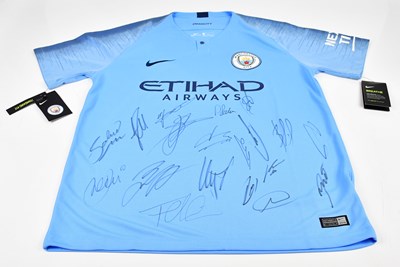 Lot 1287 - MANCHESTER CITY; an autograph replica jersey...