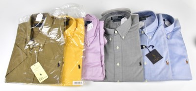 Lot 994 - RALPH LAUREN; a blue textured button down...