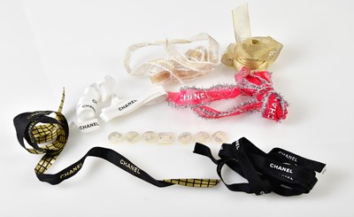 Lot 984 - CHANEL; six pearlised plastic buttons with...