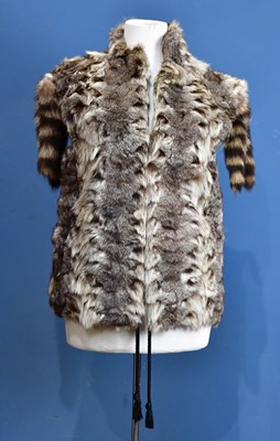 Lot 1054 - A fur gilet with ringed tail decoration to...