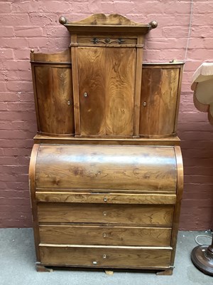Lot 2441 - A 19th century Biedermeier roll-top bureau...