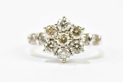 Lot 58 - An 18ct yellow gold and diamond daisy head...