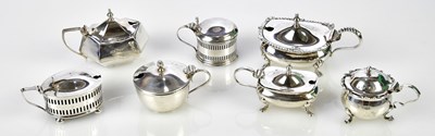 Lot 2435 - A collection of seven hallmarked silver lidded...