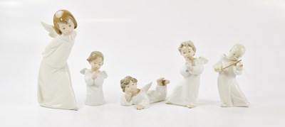 Lot 1412 - LLADRO; five Lladro figures of cherubs,...