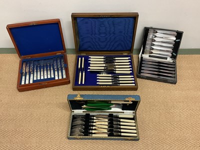 Lot 1003 - A quantity of cased silver plated cutlery and...