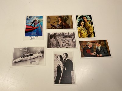 Lot 2142 - JAMES BOND, ROGER MOORE; a group of seven...