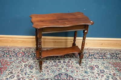 Lot 2576 - A late Victorian mahogany two tier side table...