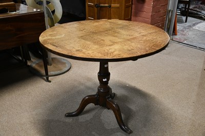 Lot 2575 - A 19th century oak tilt top tripod table,...