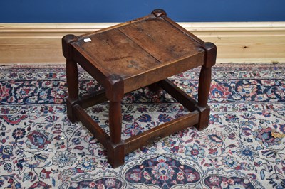 Lot 2390 - A late 19th century oak stool on block legs,...