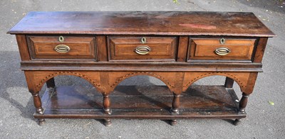 Lot 2359 - An 18th century oak dresser base with three...