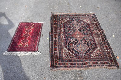 Lot 2289 - An Eastern style carpet with stylised floral...