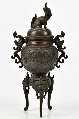 Lot 1179 - An early 20th century Japanese bronze twin...